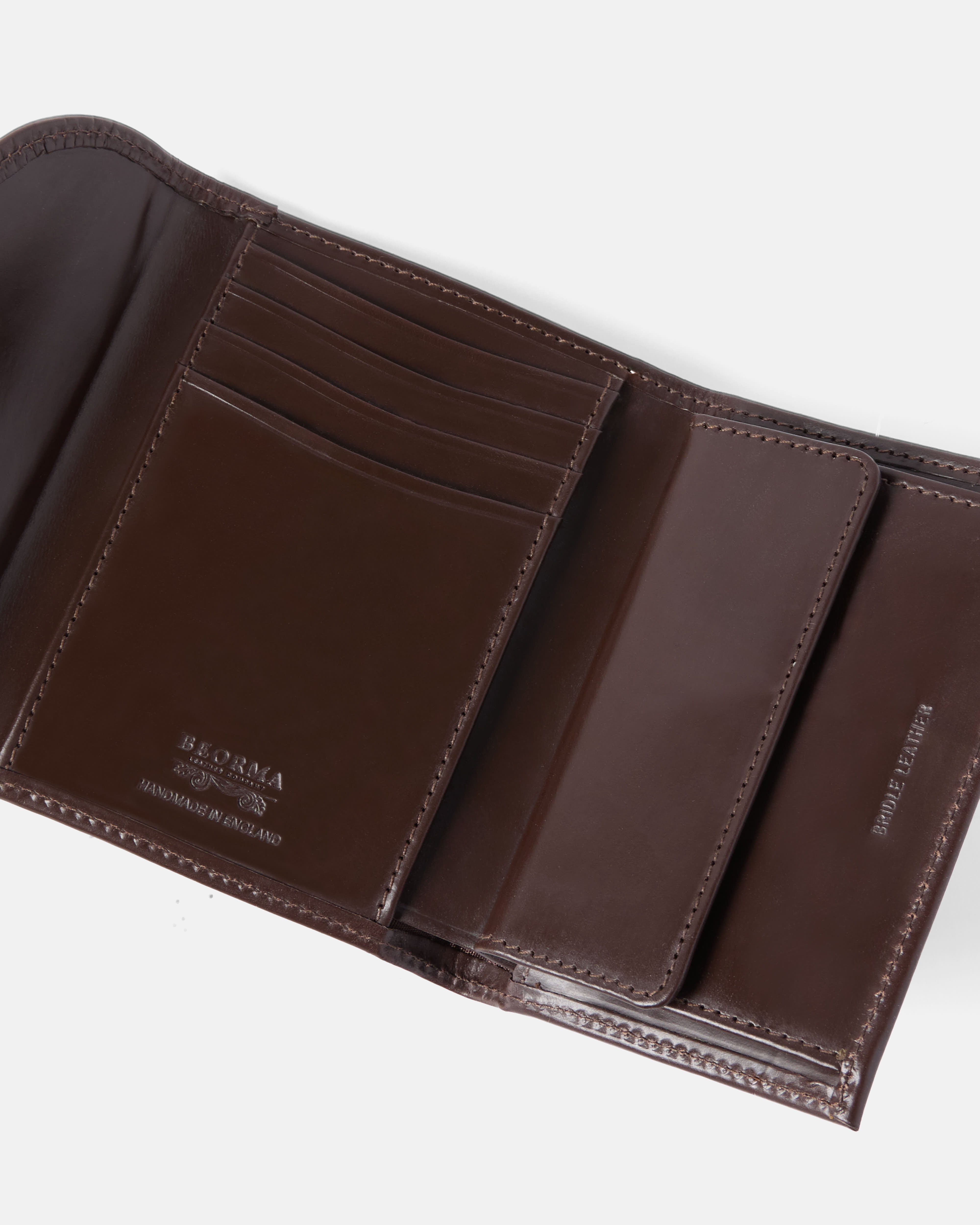 Open view of dark brown Beorma Wentworth bridle leather purse showing card slots and compartments