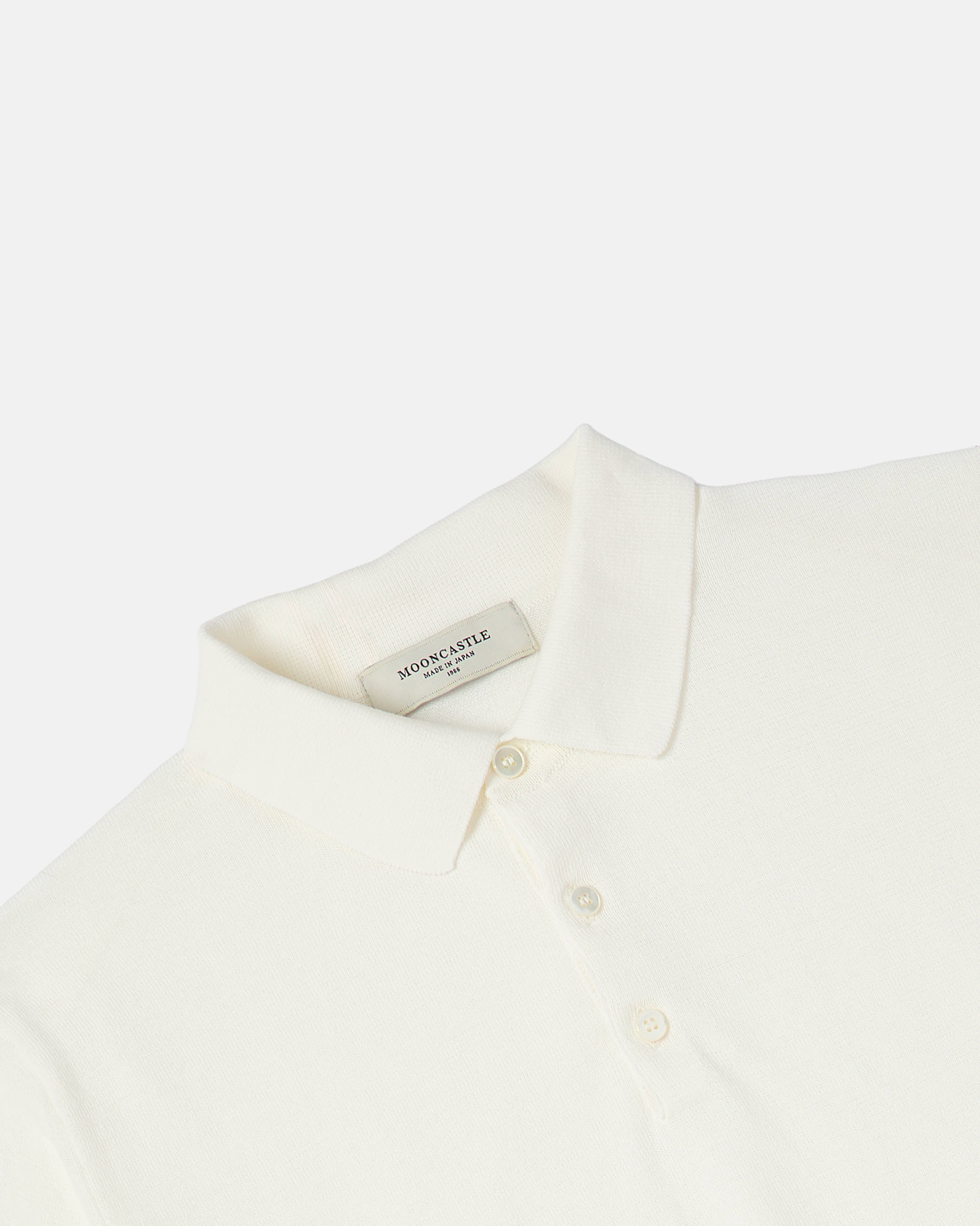 Close-up of collar and placket on off-white Mooncastle Ice Cotton knit polo shirt