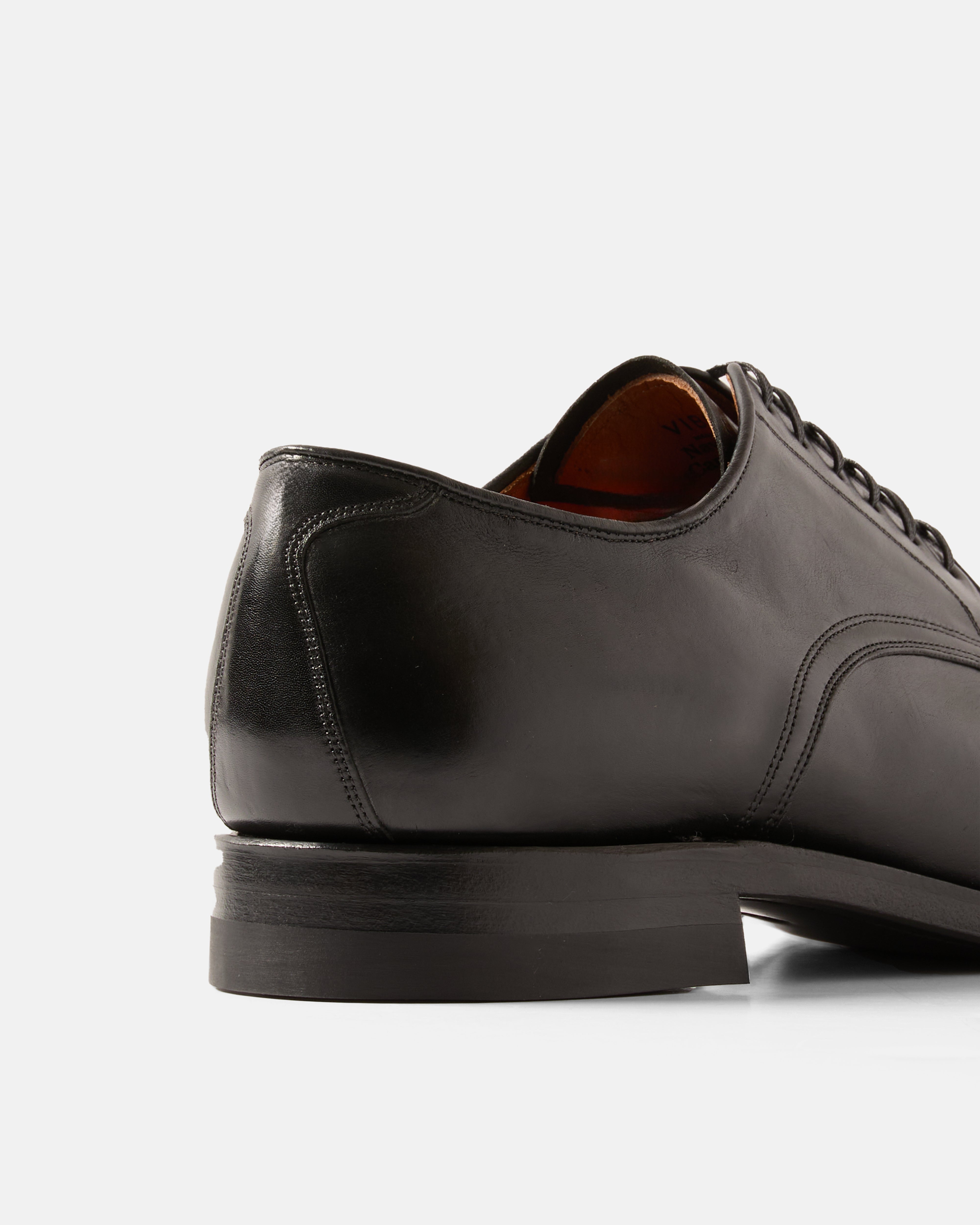 Rear view of the Viberg Kangaroo Leather Navvy Cut Shoe in Black, highlighting the handcrafted heel construction and premium leather finish.