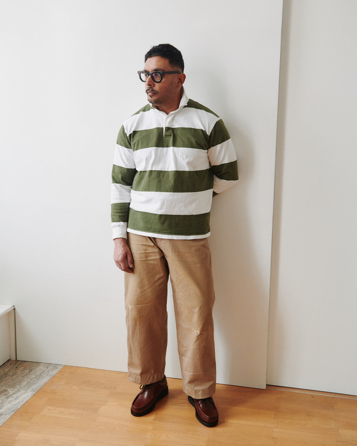 Moteen wearing the TMBS Rugby Shirt in Green and Ecru Stripe with Paraboot Thiers shoes