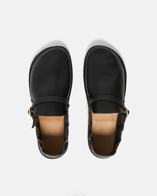 Top view of black Aurora Middle English shoe showing strap and buckle