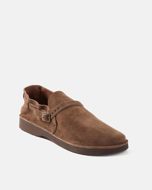 Angled view of brown Aurora Middle English suede strap shoe