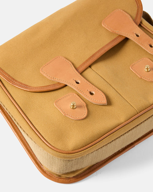 Close-up of leather trim and stitching on sandstone Beorma Arkaig game bag