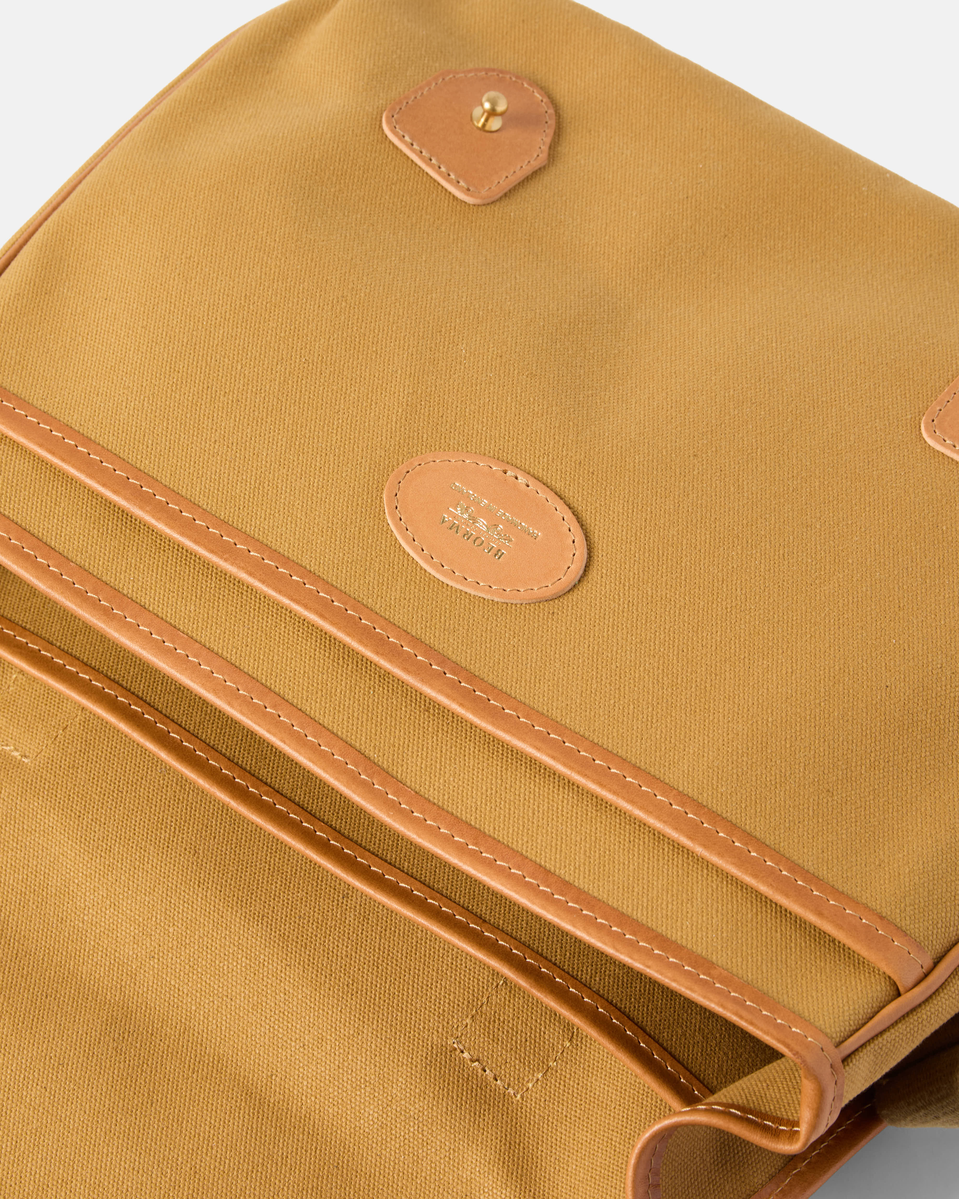 Open view of sandstone Beorma Morar messenger bag showing main compartment and pockets