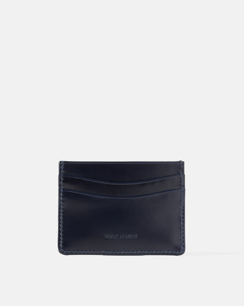 Back view of navy Beorma slimline bridle leather card case