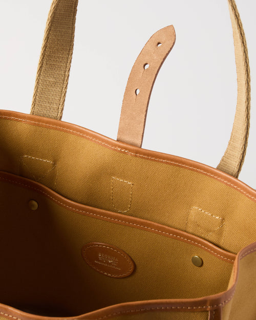 Open view of sandstone Beorma Tay tote bag showing spacious interior and pocket