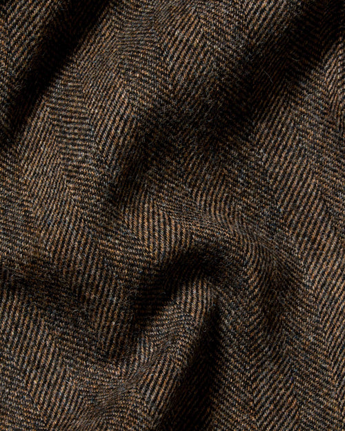 Close-up of brown herringbone wool fabric used in Chrysalis Kensington coat