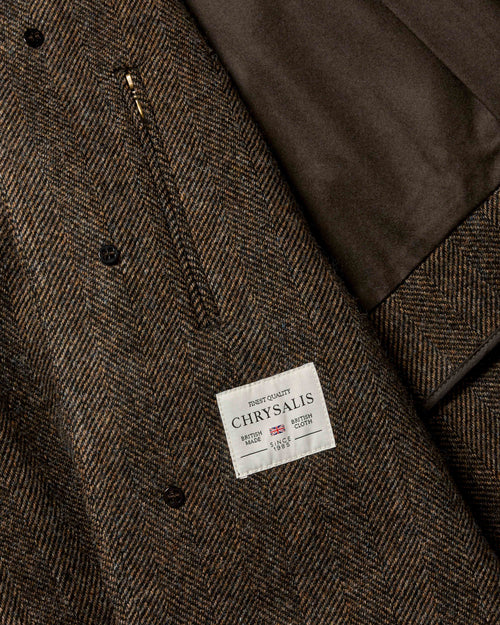 Close-up of interior pocket and lining detail on brown Chrysalis Kensington coat
