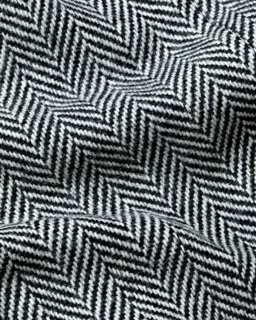 Close-up of herringbone wool fabric used in Chrysalis Kensington coat