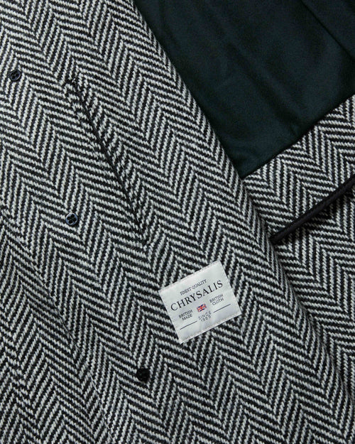 Close-up of interior pocket and lining detail on herringbone Chrysalis Kensington coat