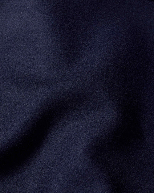 Close-up of navy wool fabric used in Chrysalis Kensington coat