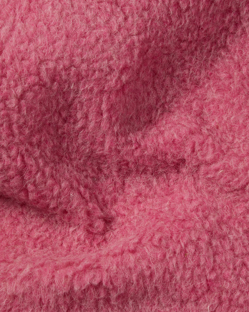 Close-up of wool fleece fabric on pink Coldbreaker gilet