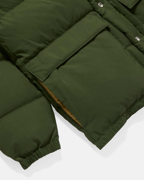 Close-up of pocket detail on olive Crescent down parka
