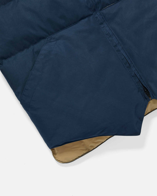 Close-up of pocket detail on navy Crescent down vest