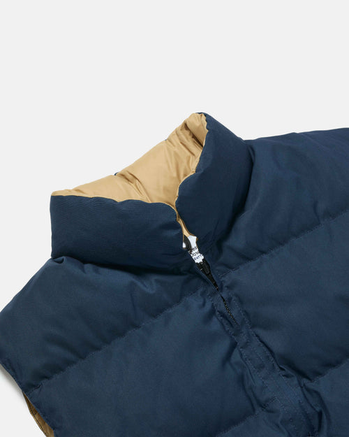 Close-up of snap front on navy Crescent nylon vest