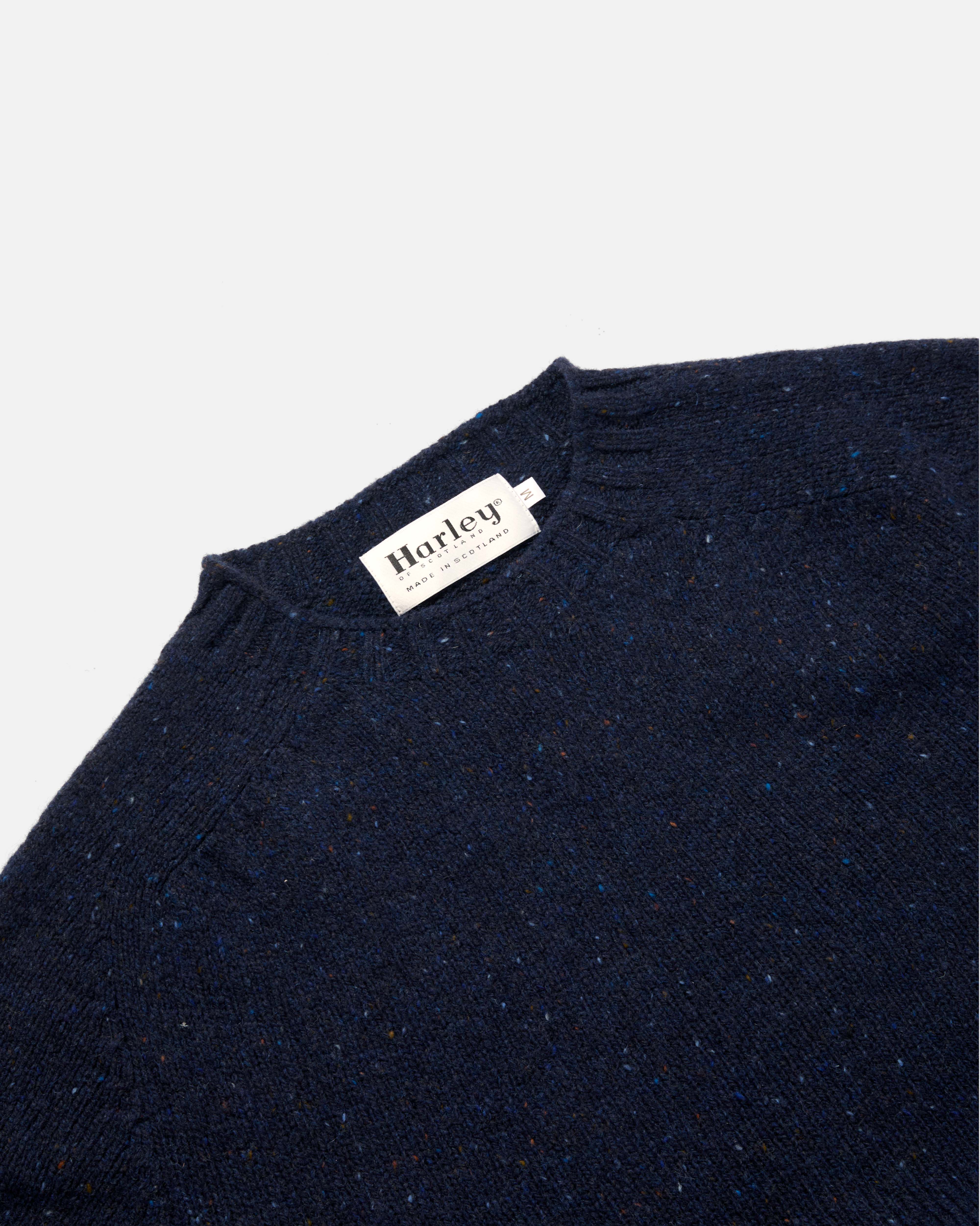 Close-up of crew neck collar detail on navy Harley Donegal Crew Neck