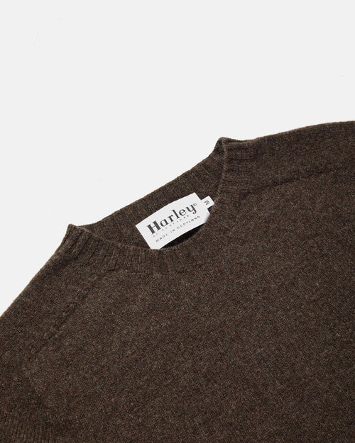 Close-up of crew neck collar detail on brown Harley Superfine Lambswool Crew Neck