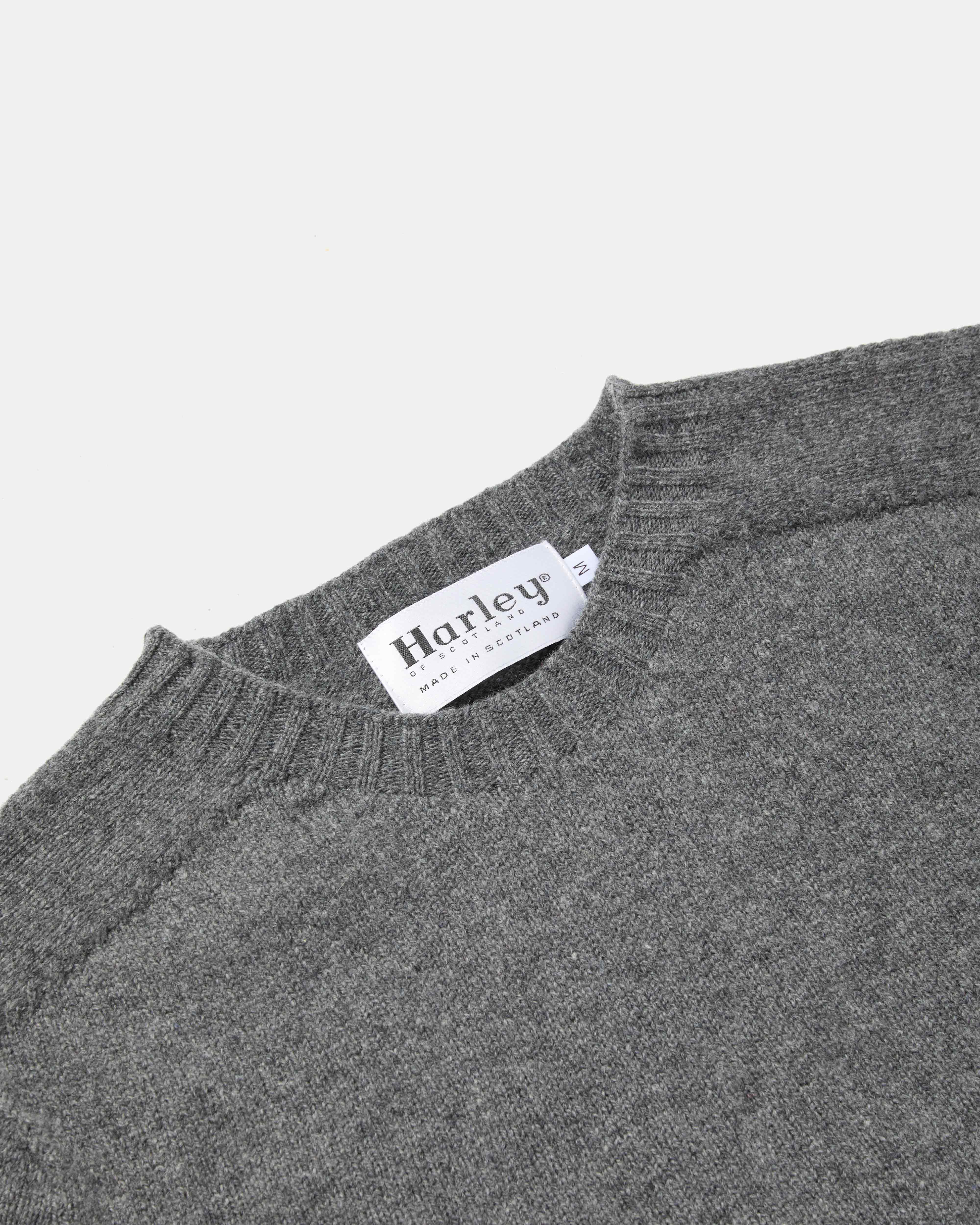 Close-up of crew neck collar detail on grey Harley Superfine Lambswool Crew Neck
