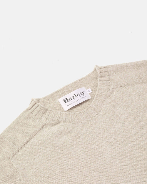 Close-up of crew neck collar detail on oatmeal Harley Superfine Lambswool Crew Neck