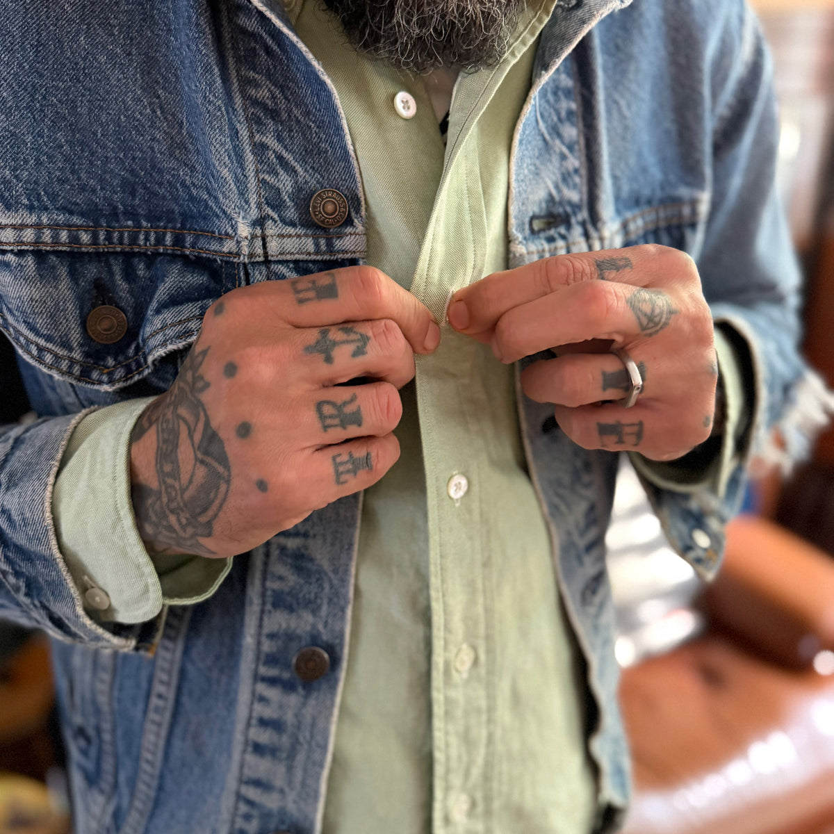 Kamakura Miles Davis Green Oxford shirt worn under a denim jacket