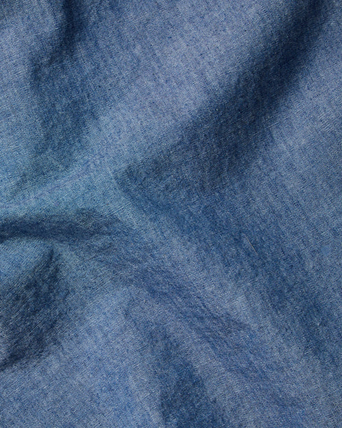 Close-up of blue chambray cotton fabric used in Kamakura Vintage Ivy button-down shirt