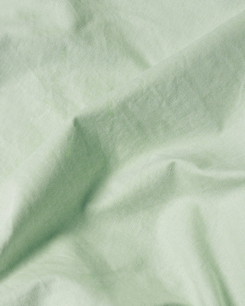 Close-up of green Oxford cotton fabric used in Kamakura Vintage Ivy shirt