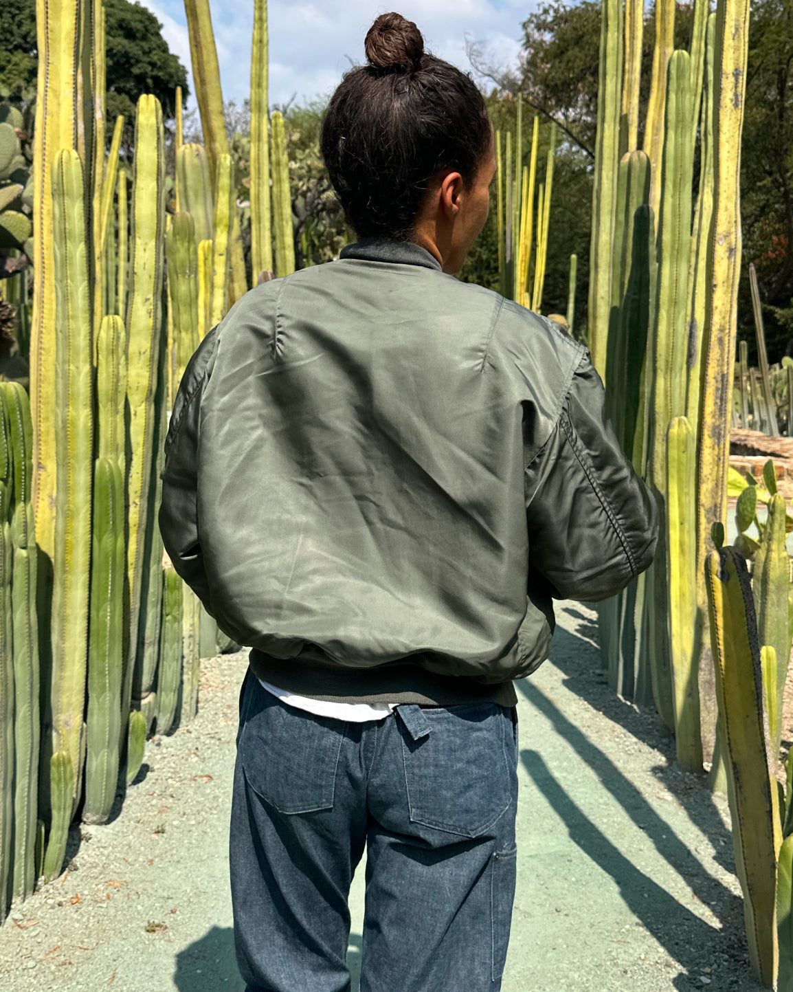Lifestyle view of Lena Dystant wearing A2 bomber jacket for the Something Old Something New series