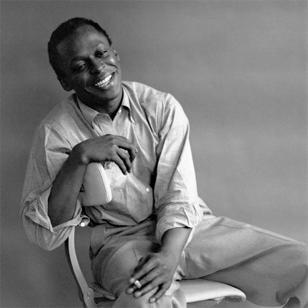 Miles Davis wearing a classic Oxford button-down shirt