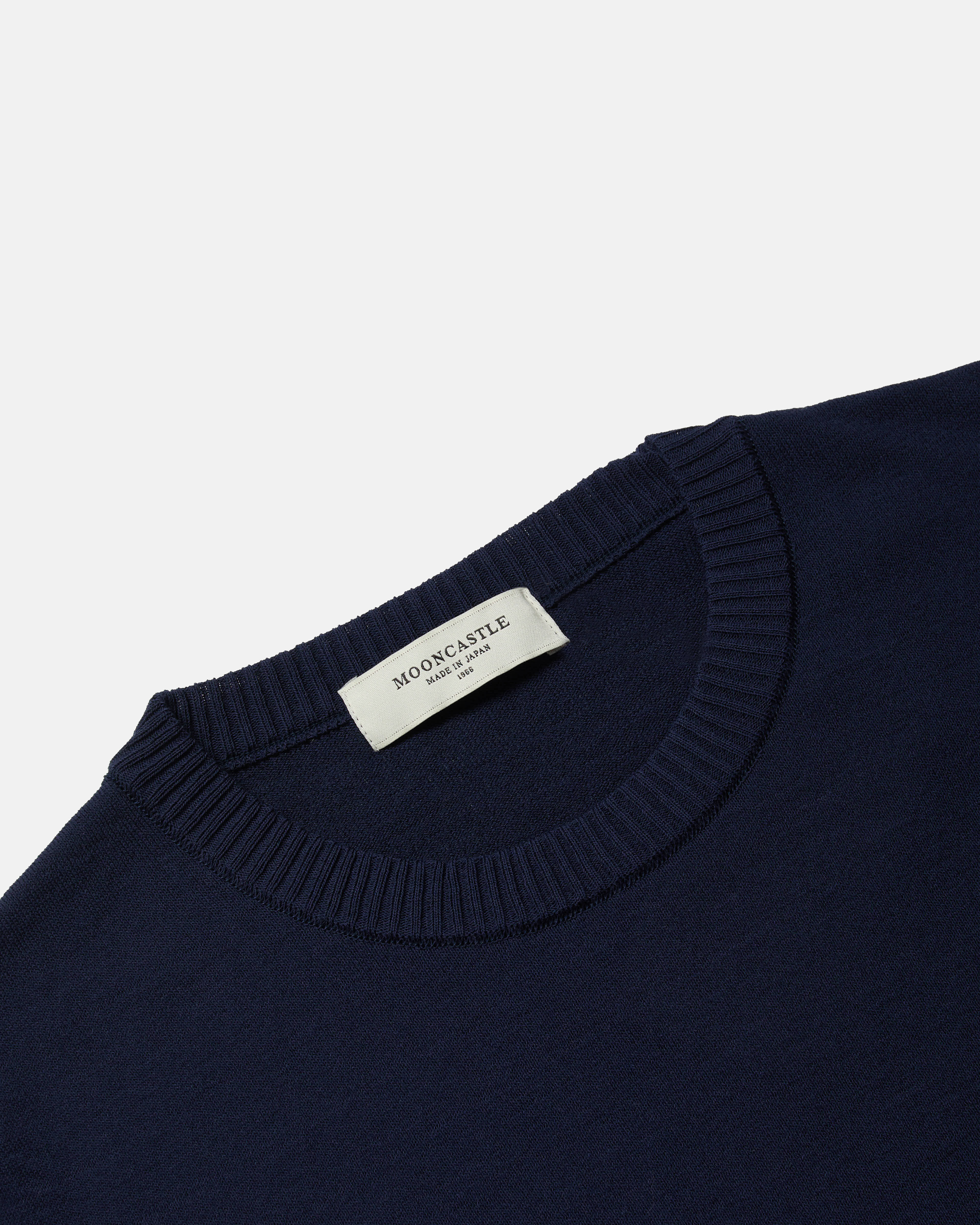 Close-up of crewneck collar on navy Mooncastle Ice Cotton tee