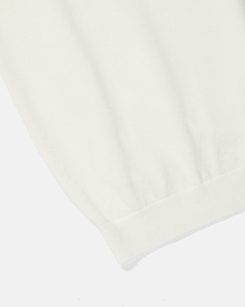 Close-up of knit texture and stitching on off-white Mooncastle Ice Cotton tee