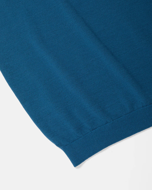 Close-up of knit texture on blue Mooncastle Ice Cotton polo shirt