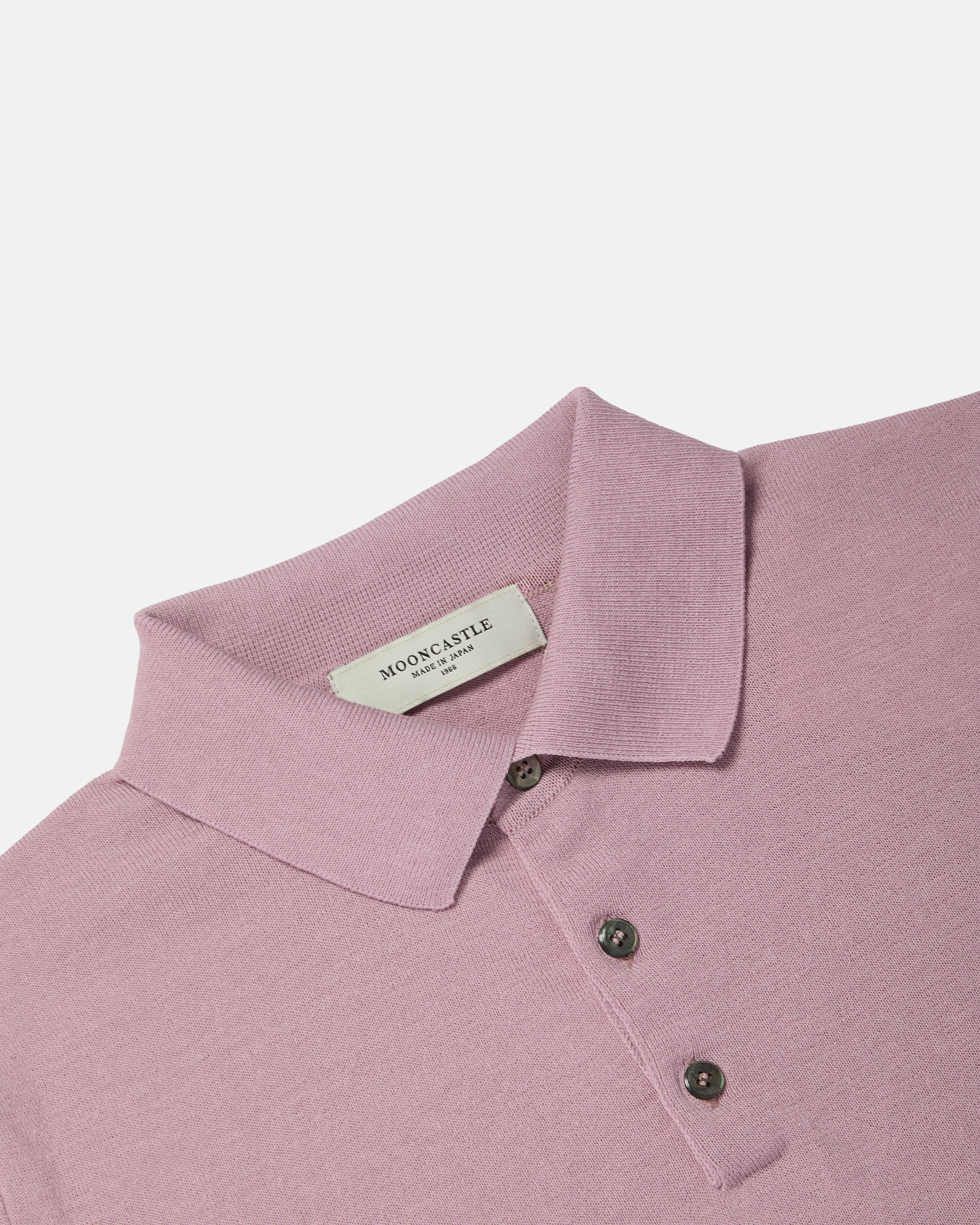 Close-up of collar and placket on sakura pink Mooncastle Ice Cotton knit polo shirt