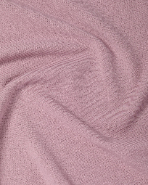 Close-up of Ice Cotton knit fabric on sakura pink Mooncastle polo shirt