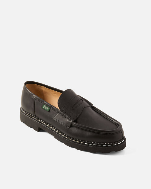 Angled view of black Paraboot Reims lisse leather penny loafer