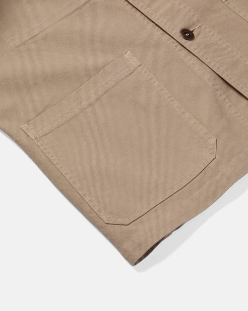 Close-up of patch pocket detail on chalk Vetra chore jacket