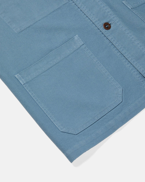 Close-up of patch pocket detail on cloud Vetra chore jacket