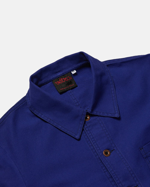 Close-up of button front on hydrone blue Vetra cotton twill jacket
