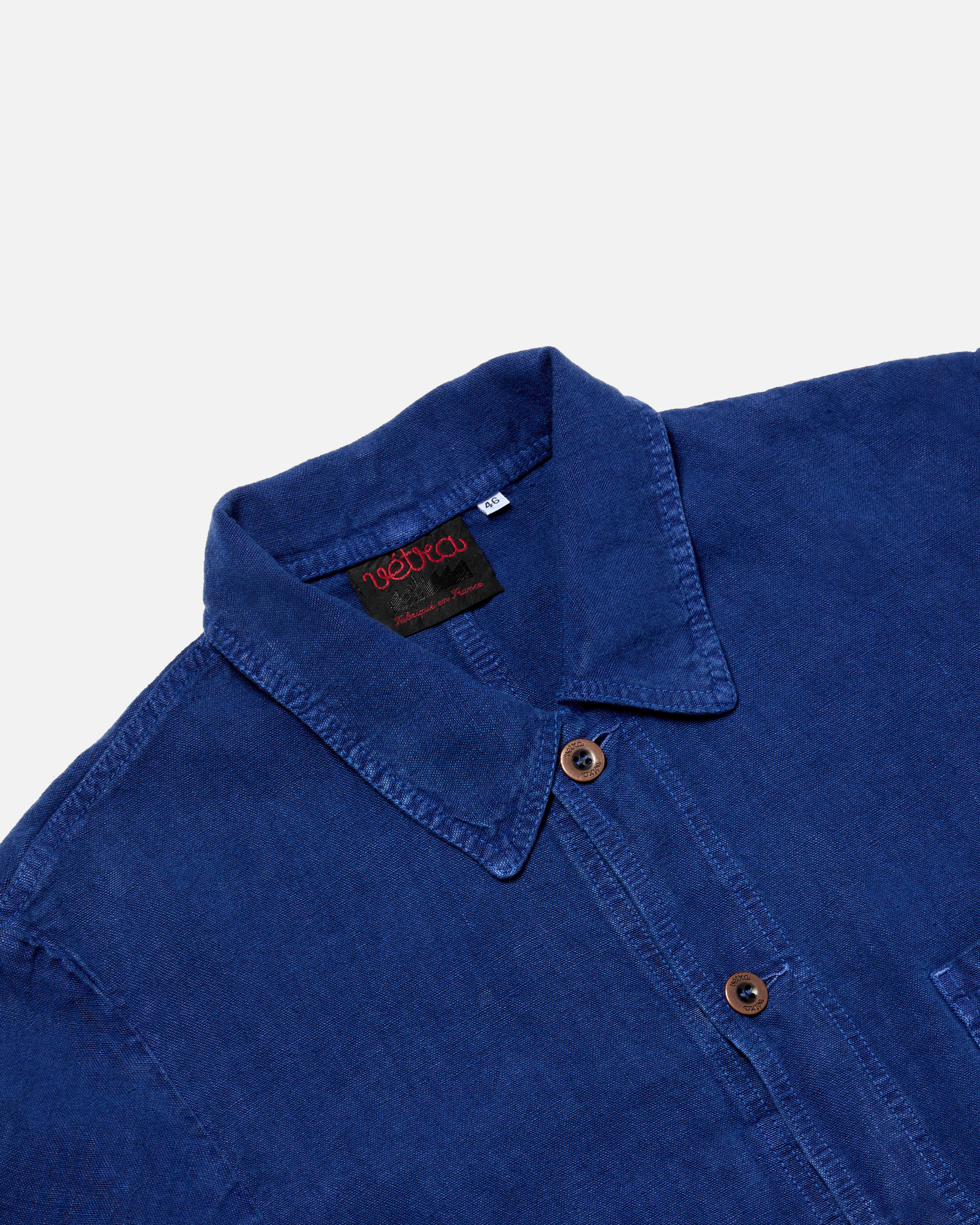 Close-up of button front on blue Vetra heavy linen jacket