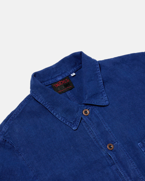 Close-up of button front on blue Vetra heavy linen jacket