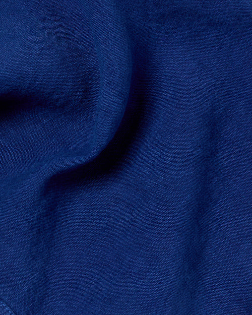 Close-up of heavyweight linen fabric on blue Vetra chore jacket