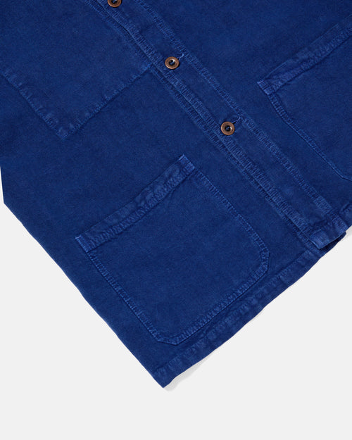 Close-up of patch pocket detail on blue Vetra heavy linen chore jacket
