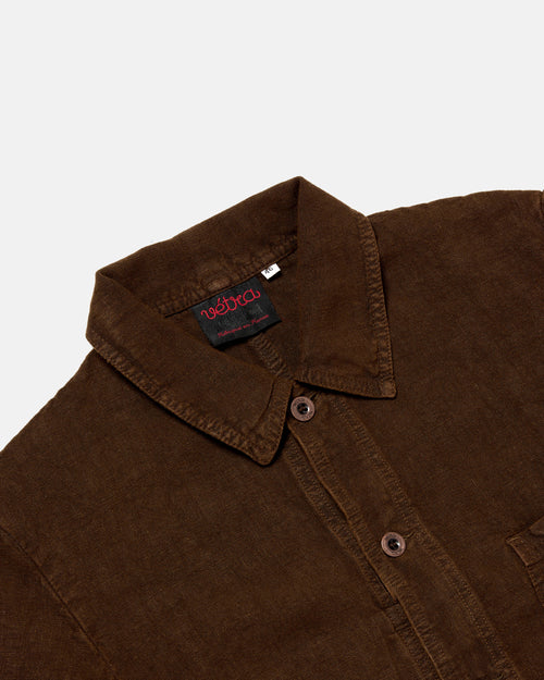 Close-up of button front on datte Vetra heavy linen jacket