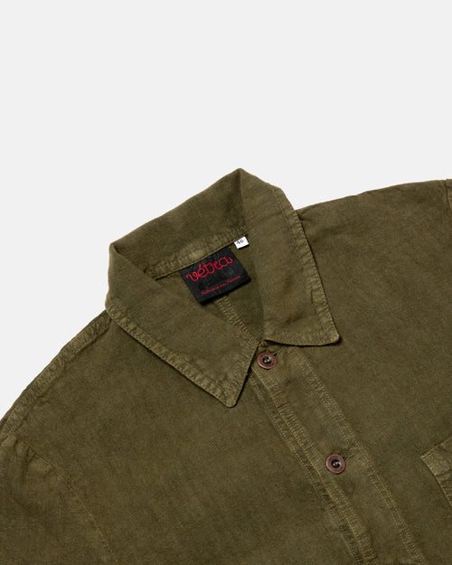 Close-up of button front on olive Vetra heavy linen jacket