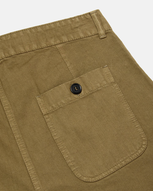 Close-up of pocket detail on olive Vetra workwear cotton trousers
