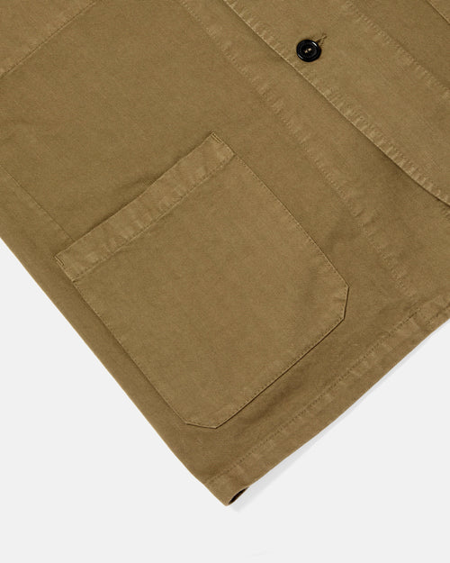 Close-up of three-button front on olive Vetra herringbone blazer