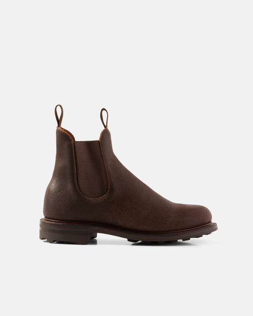 Side view of brown Viberg Chelsea roughout leather boot