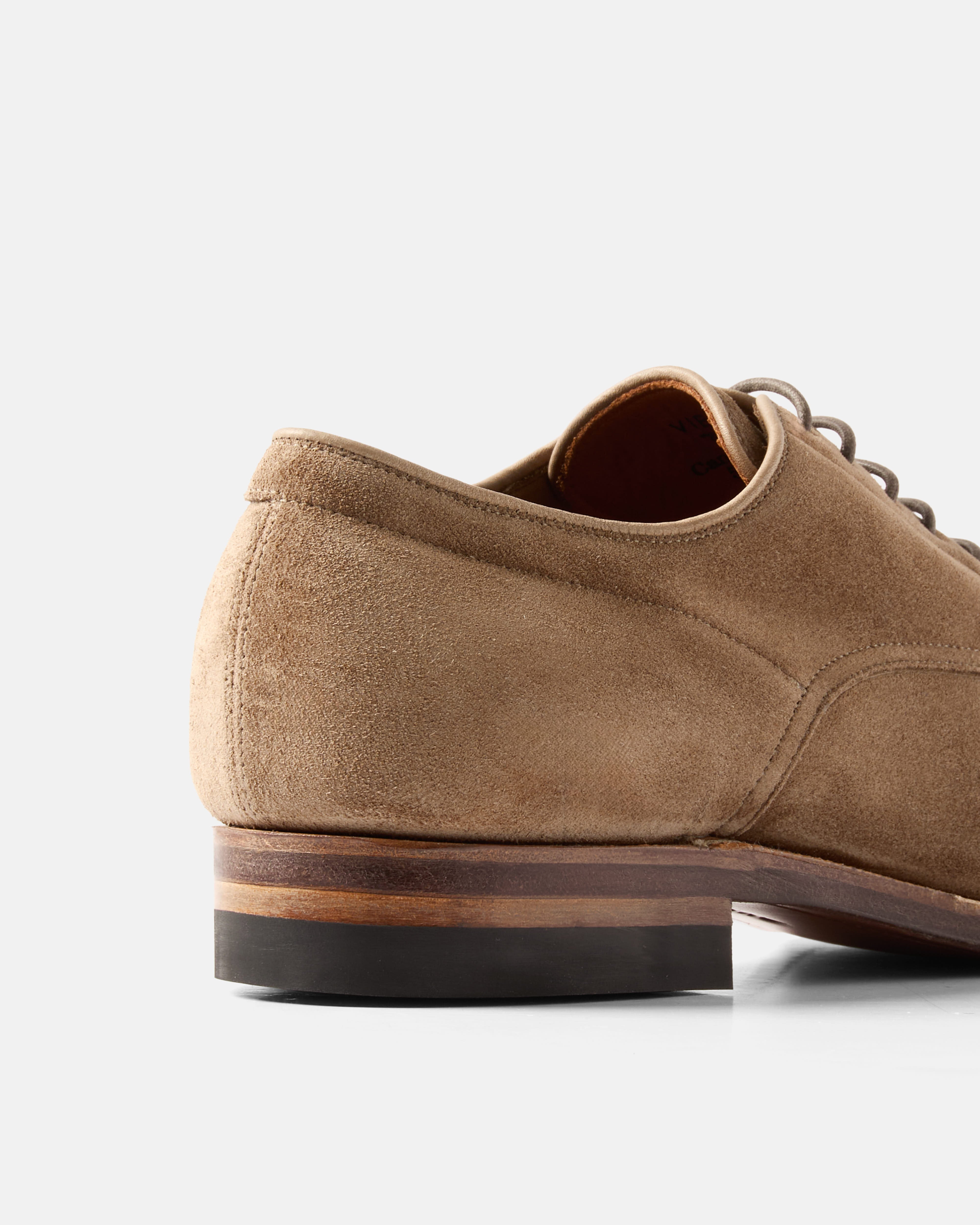Rear view of the Viberg Janus Calf Suede Savoy Derby Shoe in Bison, highlighting the handcrafted heel construction and premium finish.